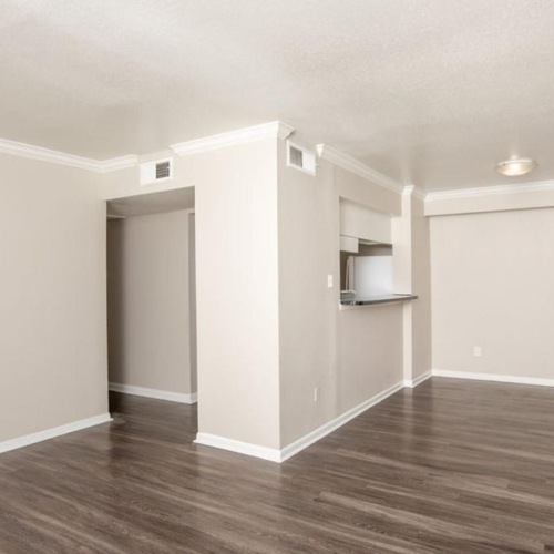 a room with a wood floor and a wood floor