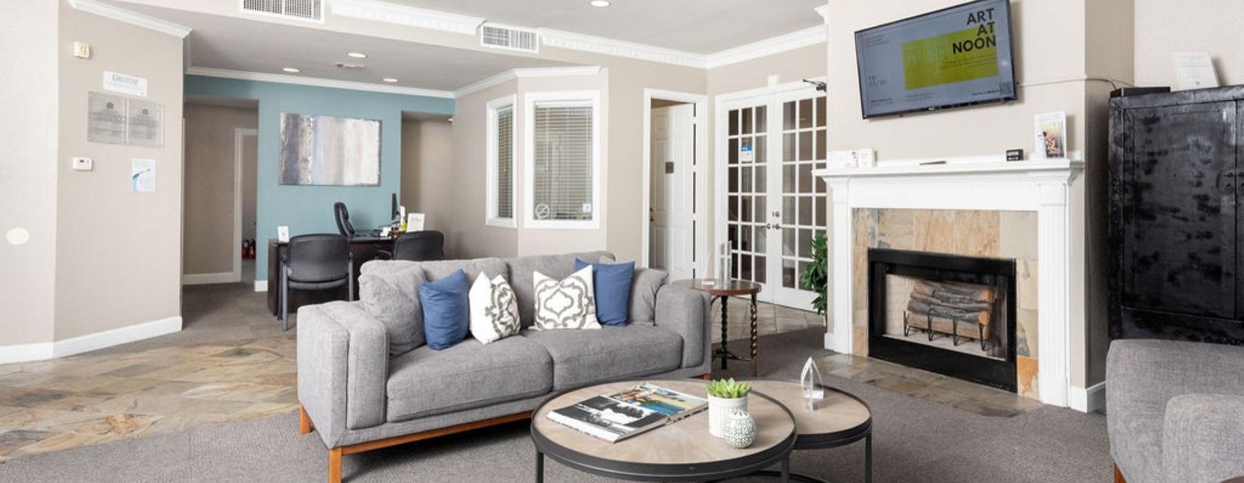 a living room with a fireplace